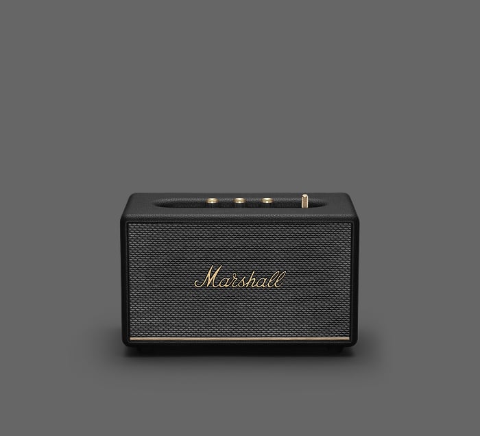 Frontalansicht des Marshall Acton III Bluetooth-Lautsprechers in Schwarz mit goldenen Reglern und Stofffront.