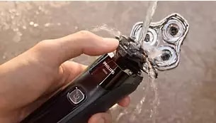 Abbildung Öffnen per Knopfdruck für eine einfache Reinigung