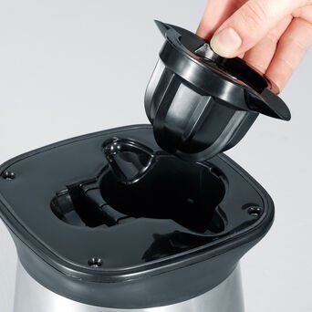 Abbildung Praktisches Aufbewahrungsfach für Presskegel.