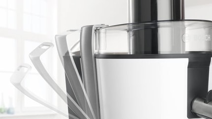 Abbildung Der starke Entsafter für ganze Früchte ohne Vorschneiden, einfach, schnell und sauber