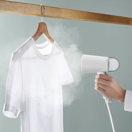 Abbildung Die zusammenklappbare Dampfbürste für unterwegs