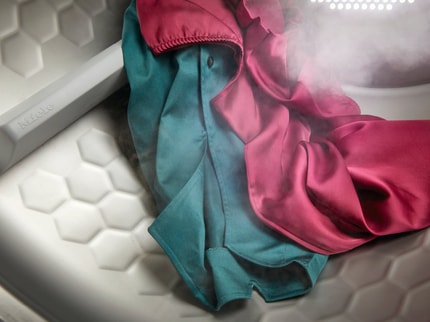 Abbildung T1 Wärmepumpentrockner mit SteamFinish, DryCare 40 und SilenceDrum für schonendes Trocknen