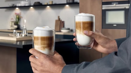 Abbildung Genuss auf Tastendruck- auch für  zwei Tassen gleichzeitig